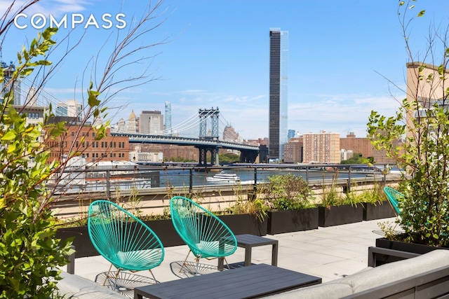 37 Bridge St Unit 1F, New York City, NY 11201 - wooden deck featuring a water view and a city view