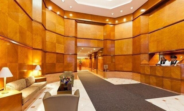 150 W 56th St Unit 3104, New York City, NY 10019 - lobby with recessed lighting and a towering ceiling