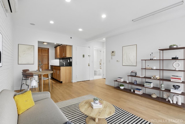 142 Skillman Ave Unit 2B, New York City, NY 11211 - living room with light wood finished floors, baseboards, and recessed lighting
