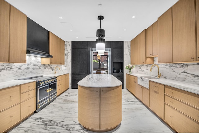 155 W 11th St Unit 4G, New York City, NY 10011 - kitchen with range with two ovens, light marble finish flooring, ceiling fan, a kitchen island, and recessed lighting