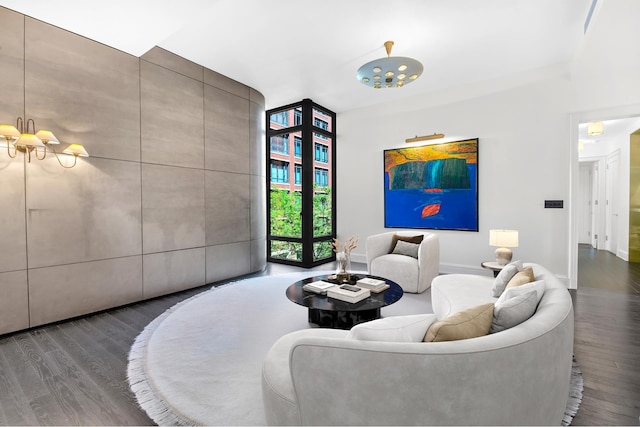 155 W 11th St Unit 4G, New York City, NY 10011 - living room with wood finished floors and a chandelier