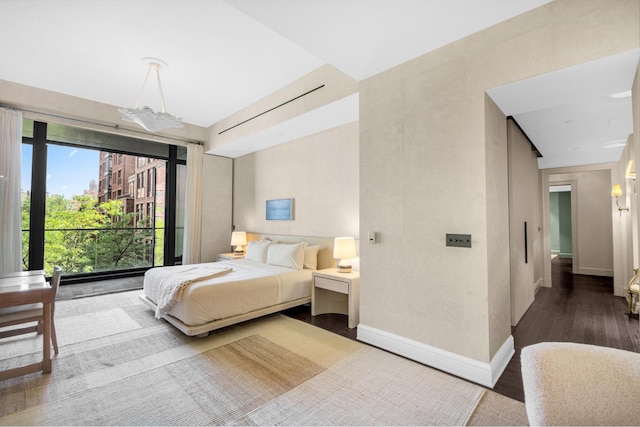 155 W 11th St Unit 4G, New York City, NY 10011 - bedroom featuring wood finished floors and baseboards