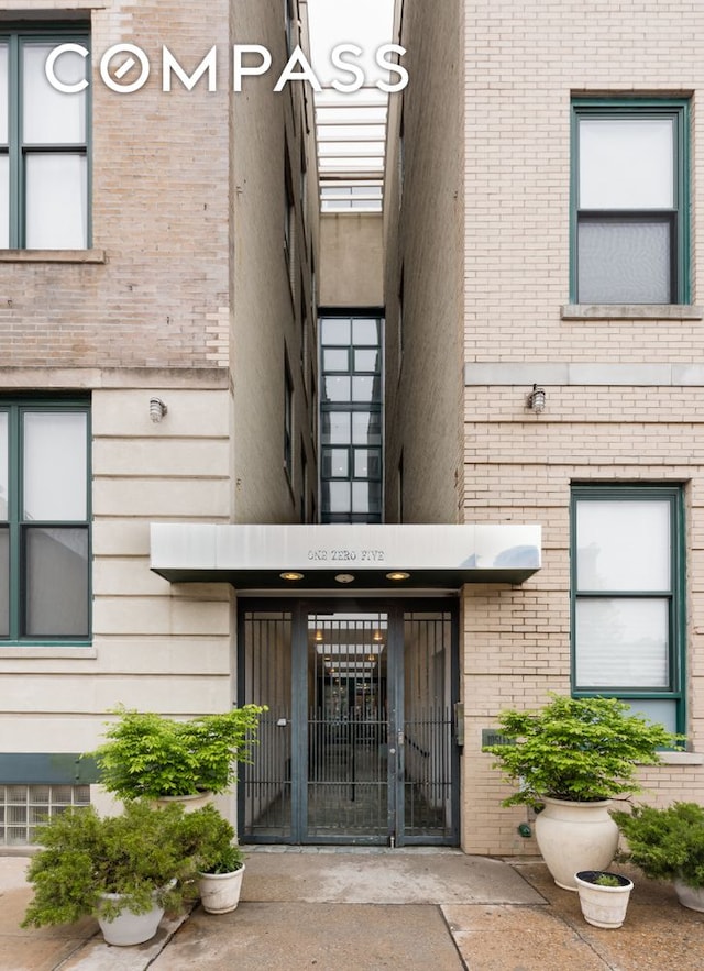 105 Lexington Ave Unit 2E, New York City, NY 11238 - entrance to property with brick siding and a gate