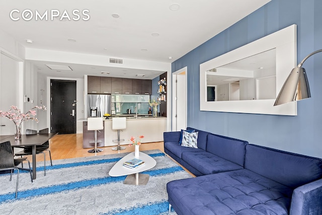 309 2nd St Unit 2F, New York City, NY 11215 - living area featuring light wood-style floors