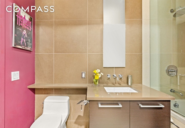 309 2nd St Unit 2F, New York City, NY 11215 - full bath with vanity, bathing tub / shower combination, toilet, and tile walls