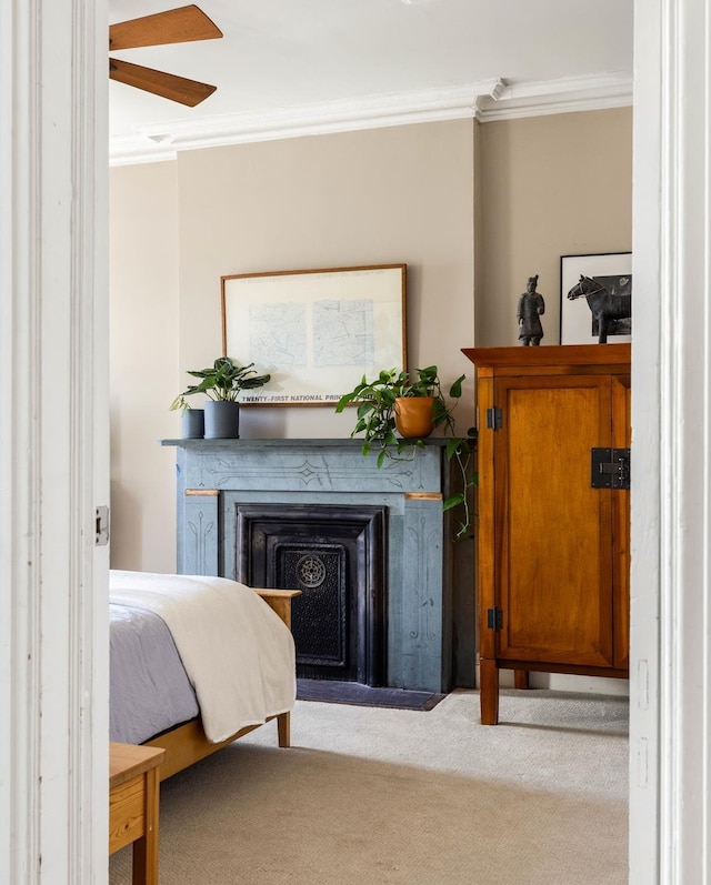 208 Garfield Place, New York City, NY 11215 - bedroom with crown molding, a fireplace, and carpet floors