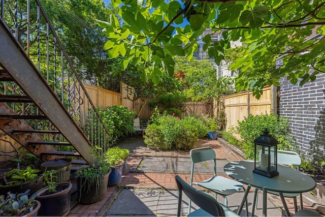 208 Garfield Place, New York City, NY 11215 - fenced backyard featuring stairway and a patio