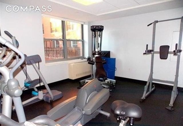 837 Washington Ave Unit 4B, New York City, NY 10451 - workout room featuring baseboards