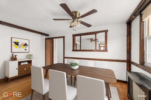 3707 Quentin Rd, New York City, NY 11234 - dining room featuring light wood-style flooring, ceiling fan, and baseboards