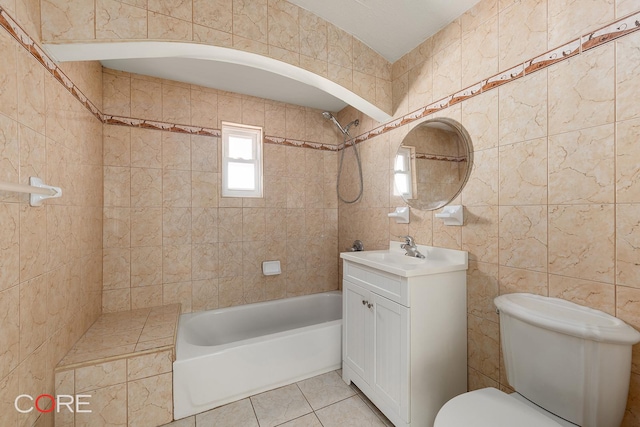 3707 Quentin Rd, New York City, NY 11234 - bathroom with tile walls, vanity, shower / washtub combination, toilet, and tile patterned flooring