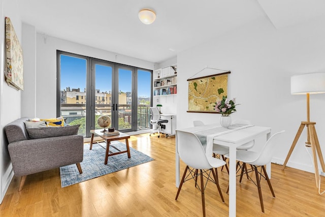 500 4th Ave Unit 5F, New York City, NY 11215 - dining room with french doors and light wood finished floors