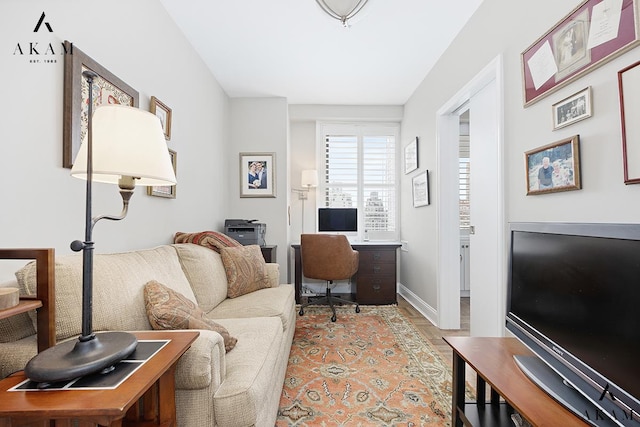 300 E 74th St Unit 15-E, New York City, NY 10021 - office area featuring light wood-style flooring and baseboards