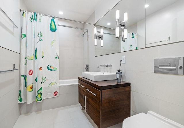 185 13th St Unit 3-B, New York City, NY 11215 - bathroom with tiled shower / bath, vanity, toilet, tile walls, and recessed lighting