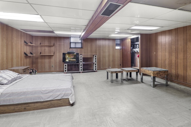 1548 W 8th St, New York City, NY 11204 - bedroom with a paneled ceiling, wood walls, and light flooring