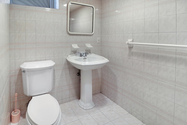 1548 W 8th St, New York City, NY 11204 - bathroom featuring tile walls, toilet, and tile patterned flooring