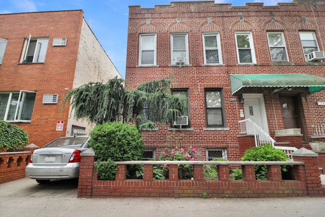 1548 W 8th St, New York City, NY 11204 - view of front of property with brick siding and cooling unit