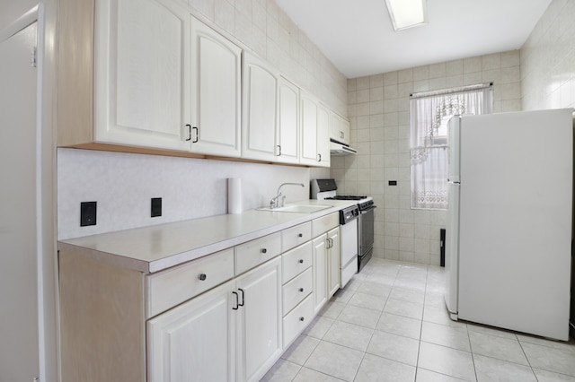 1548 W 8th St, New York City, NY 11204 - kitchen featuring white appliances, a sink, light countertops, under cabinet range hood, and light tile patterned floors
