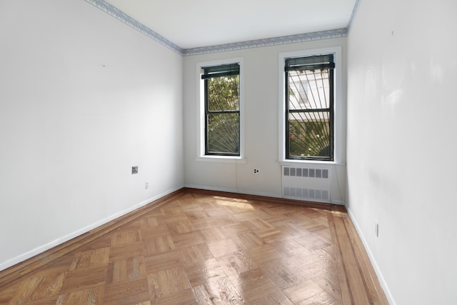 1548 W 8th St, New York City, NY 11204 - unfurnished room featuring radiator heating unit and baseboards