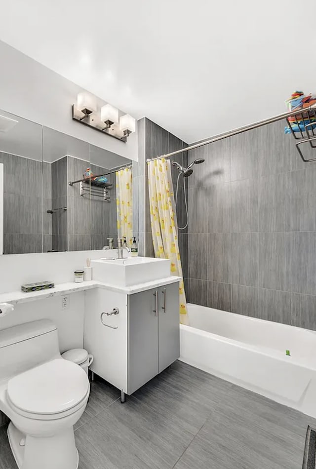 549 Borden Ave Unit 9K, New York City, NY 11101 - bathroom with toilet, shower / tub combo, vanity, and tile patterned floors