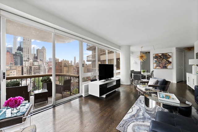167 E 61st St Unit 16B, New York City, NY 10065 - living room with healthy amount of natural light and wood finished floors