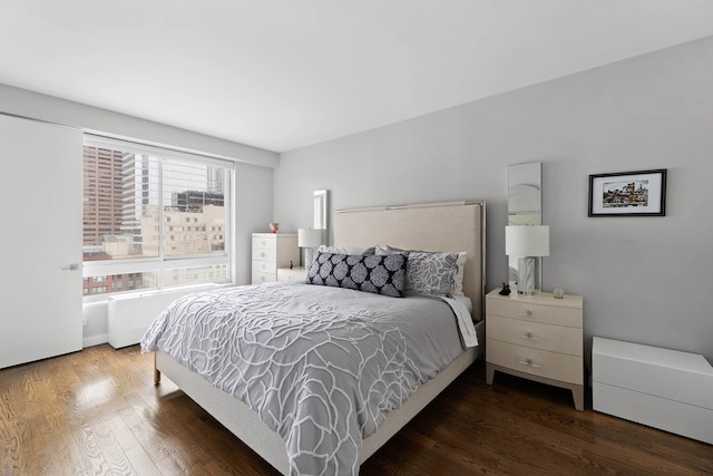 167 E 61st St Unit 16B, New York City, NY 10065 - bedroom with wood finished floors
