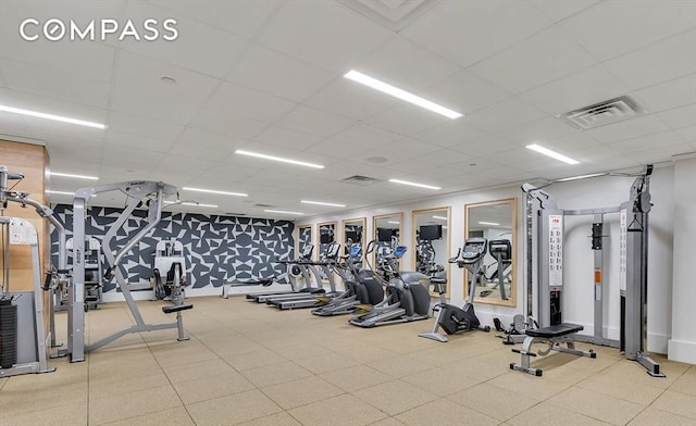 260 Park Ave S Unit 9G, New York City, NY 10010 - exercise room with a drop ceiling and baseboards