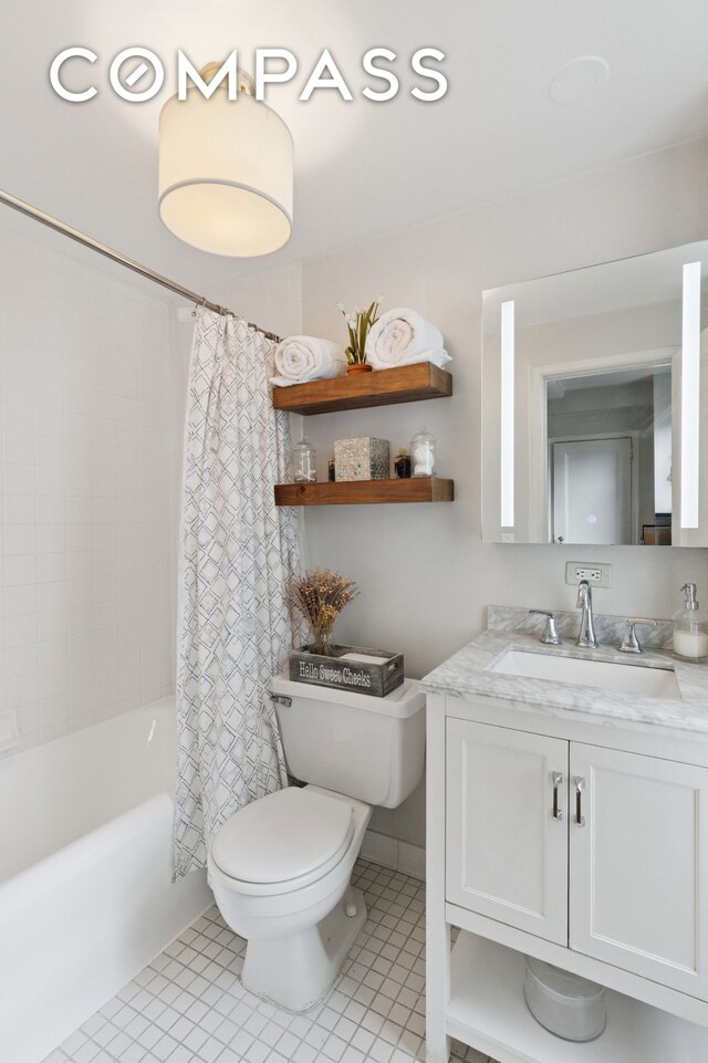 325 W 45th St Unit 700, New York City, NY 10036 - full bath with vanity, shower / bath combo, and tile patterned flooring