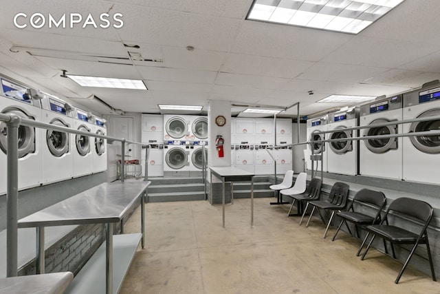 325 W 45th St Unit 700, New York City, NY 10036 - communal laundry room with estacked washer and dryer and washing machine and clothes dryer