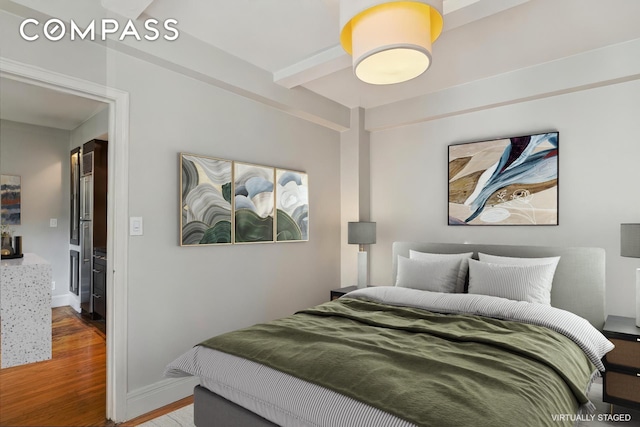 325 W 45th St Unit 700, New York City, NY 10036 - bedroom featuring wood finished floors