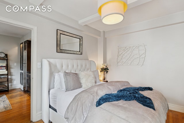 325 W 45th St Unit 700, New York City, NY 10036 - bedroom with wood finished floors and baseboards