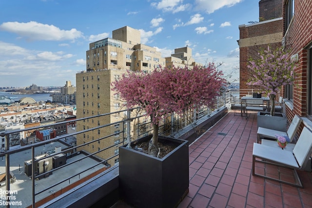 510 E 86th St Unit 17C, New York City, NY 10028 - view of patio / terrace featuring a balcony and a view of city