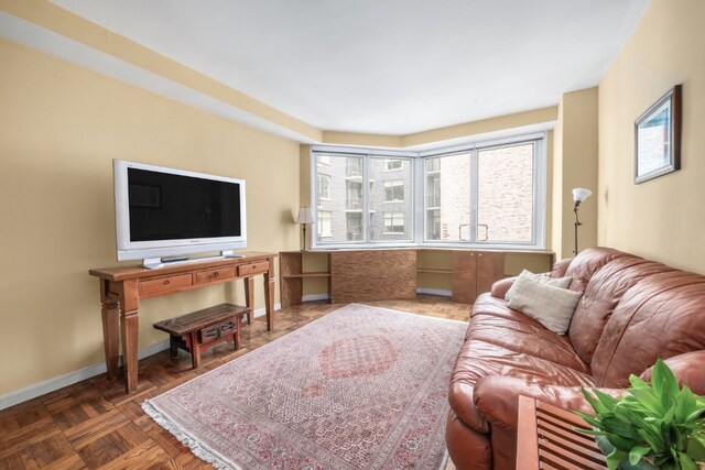 301 E 22nd St Unit 9V, New York City, NY 10010 - living room with baseboards