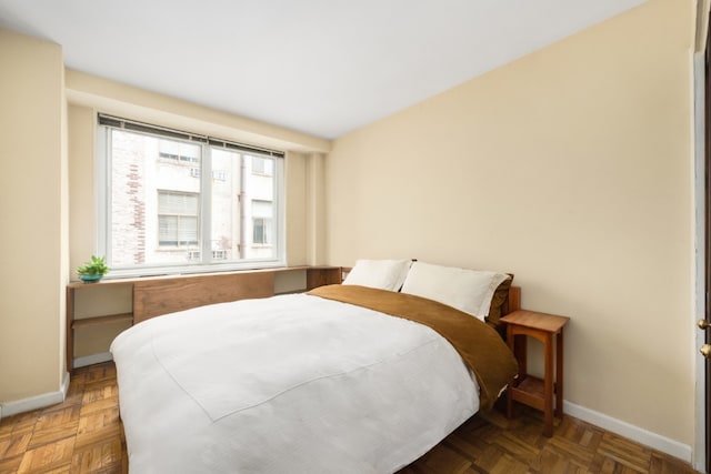 301 E 22nd St Unit 9V, New York City, NY 10010 - bedroom featuring baseboards
