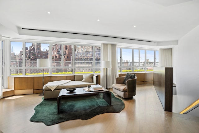 799 Park Ave Unit 19/20B, New York City, NY 10021 - living area featuring a view of city, light wood finished floors, and recessed lighting