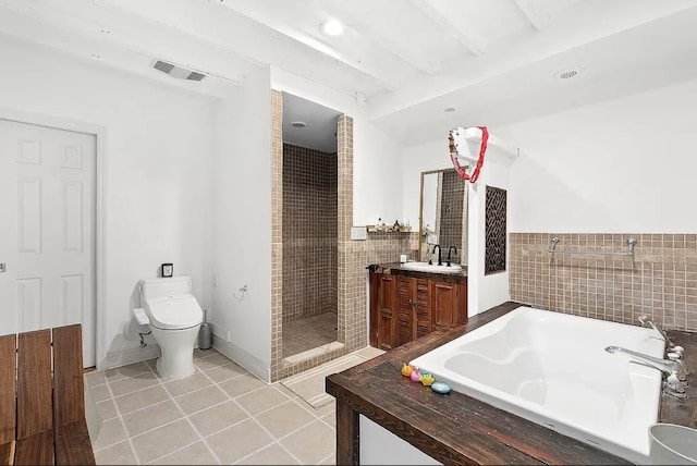 24 W 126th St, New York City, NY 10027 - full bathroom featuring a garden tub, a shower stall, vanity, tile patterned flooring, and tile walls