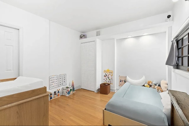 24 W 126th St, New York City, NY 10027 - bedroom with light wood-style flooring