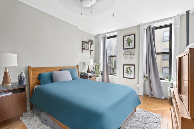 24 W 126th St, New York City, NY 10027 - bedroom featuring light wood finished floors and ceiling fan