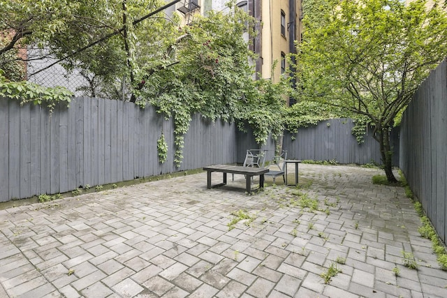 24 W 126th St, New York City, NY 10027 - fenced backyard featuring a patio