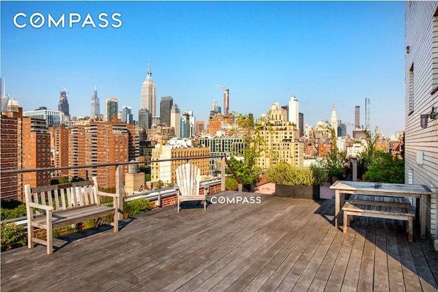 360 W 22nd St Unit 5M, New York City, NY 10011 - wooden terrace featuring a view of skyline