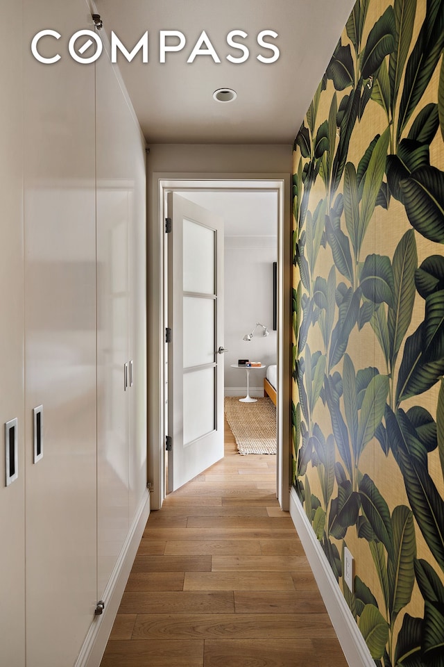 360 W 22nd St Unit 5M, New York City, NY 10011 - hall with wood finished floors and baseboards