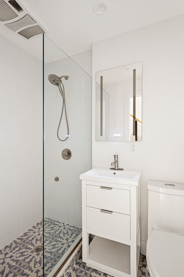 435 E 86th St Unit Gc, New York City, NY 10028 - full bath featuring tiled shower, vanity, toilet, and recessed lighting