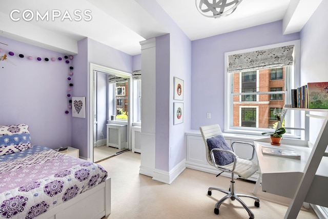 49 E 96th St Unit 4D, New York City, NY 10128 - bedroom featuring light carpet, a desk, a closet, and radiator
