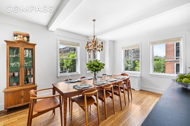 49 E 96th St Unit 4D, New York City, NY 10128 - dining area with beam ceiling and light wood-type flooring