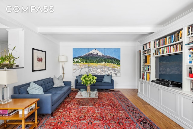 49 E 96th St Unit 4D, New York City, NY 10128 - living area with light wood-style flooring, beamed ceiling, and ornamental molding