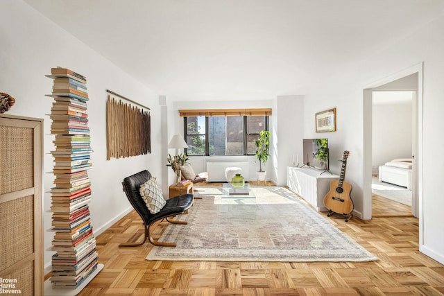 201 E 77th St Unit 7A, New York City, NY 10075 - sitting room featuring baseboards