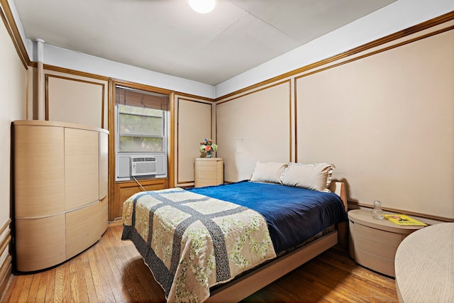 435 Convent Ave Unit 32, New York City, NY 10031 - bedroom with light wood-type flooring and cooling unit