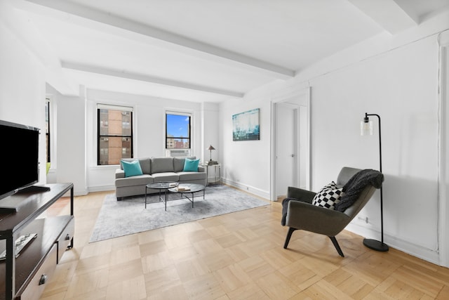 175 W 93rd St Unit 11B, New York City, NY 10025 - living area featuring beamed ceiling and baseboards