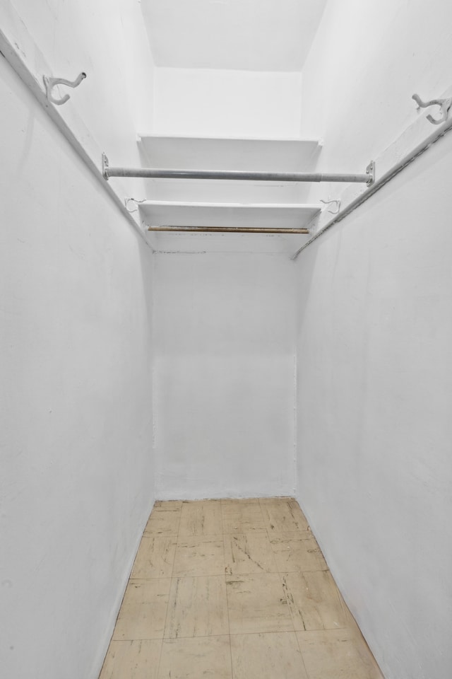 175 W 93rd St Unit 11B, New York City, NY 10025 - spacious closet featuring tile patterned floors
