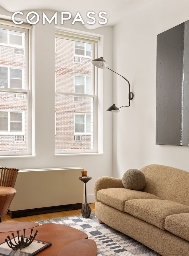 9 Barrow St Unit 3C, New York City, NY 10014 - sitting room featuring wood finished floors