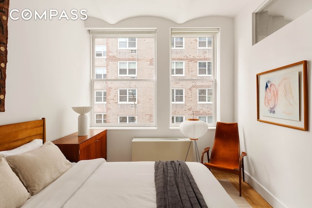 9 Barrow St Unit 3C, New York City, NY 10014 - bedroom featuring wood finished floors and baseboards